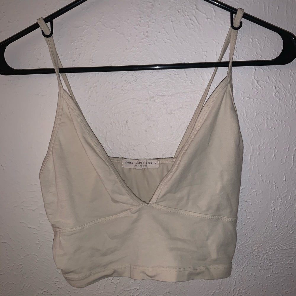 Cream colored v neck tank top